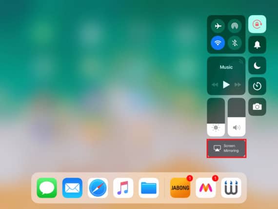 Swipe up on home screen and select Screen Mirroring