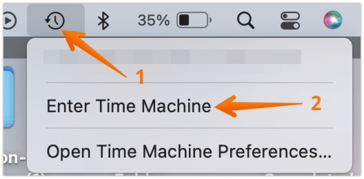Click on Clock Icon and Enter Time Machine