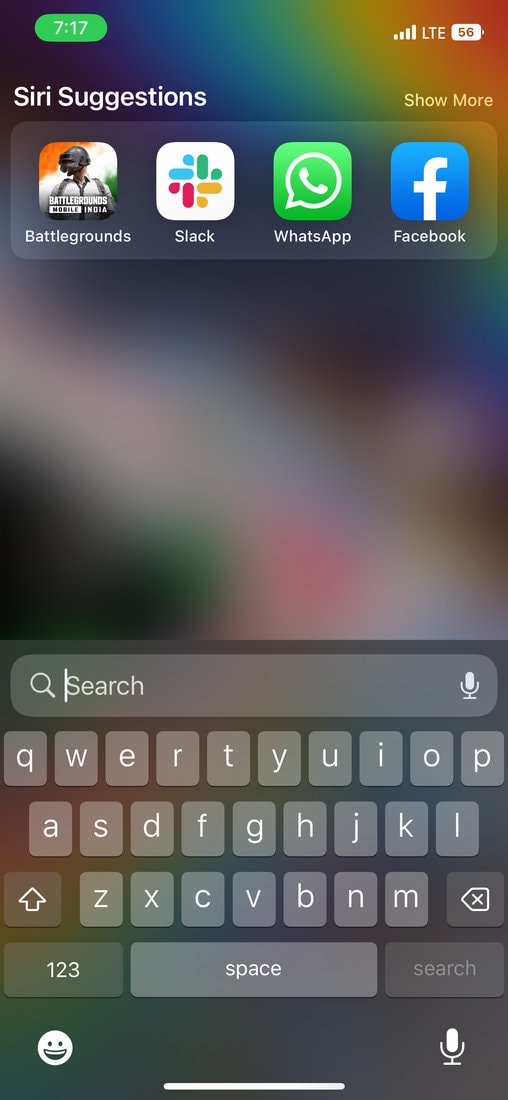 Swipe down the home screen to access Spotlight search