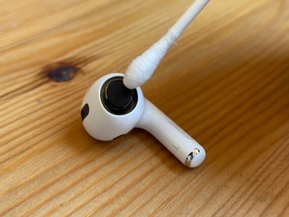 Clean AirPods Speaker Grill with Cotton Swab to make AirPods louder if quiet