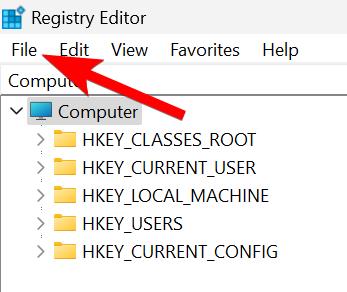 Registry Editor with an arrow on File tab
