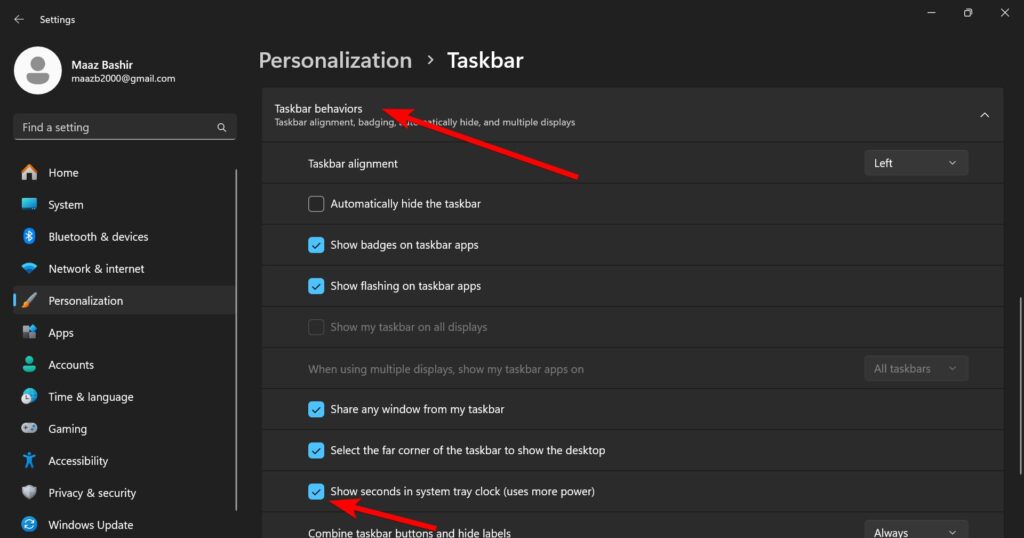 Show seconds in system tray clock option is check box under Taskbar behaviors settings